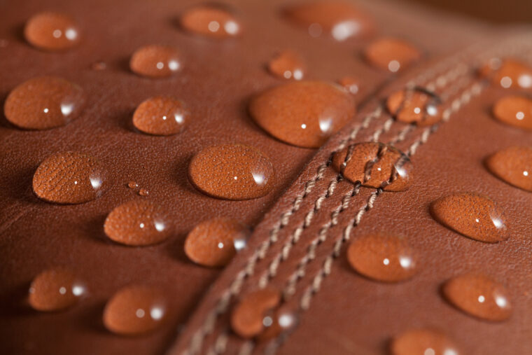 Closeup of Water Drops on Leather Boot
